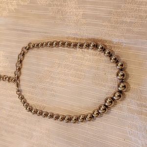 Gold tone necklace adjustable length